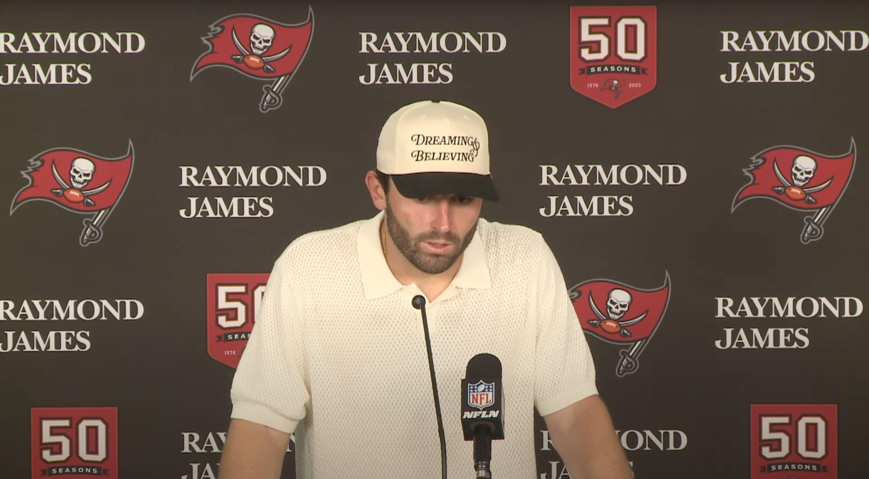 Baker Mayfield talks to reporters after the Bucs' Week 4 loss to the Eagles.